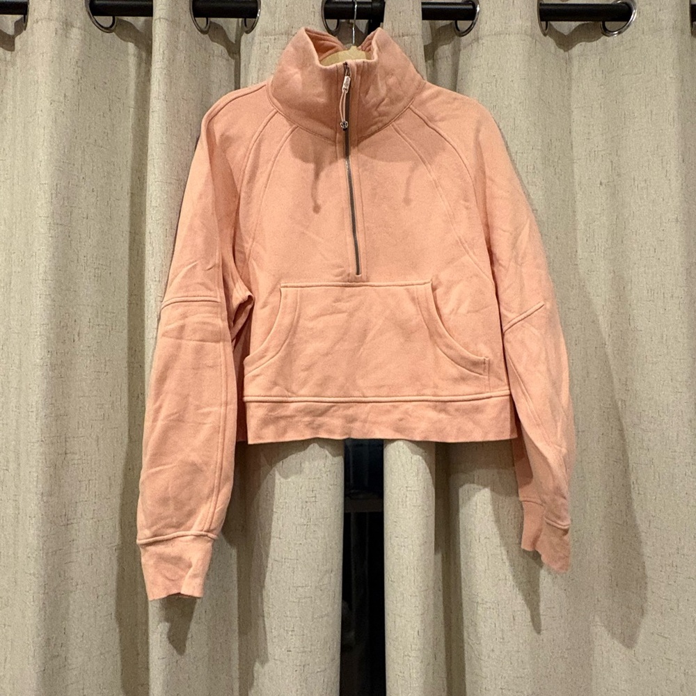 Women's Peachy colored Lululemon scuba quarter zip